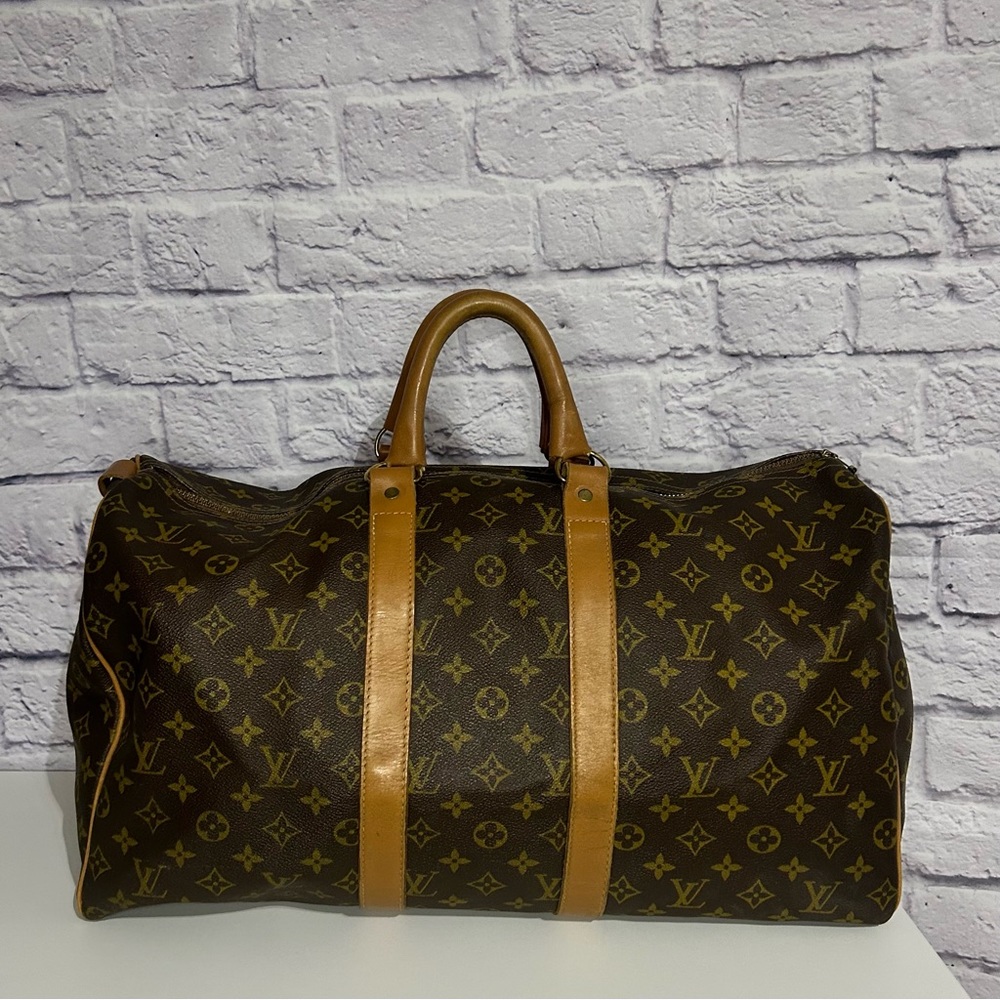 Incredibly RARE collector’s Louis Vuitton Monogram Keepall 50